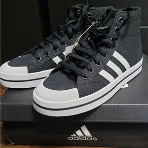 BRAND NEW Adidas Bravada Mid-high top, black & white athletic shoes.
